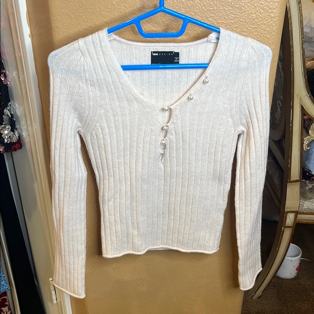 Cream Soft Ribbed Sweater with Button Detail fits like a size Small